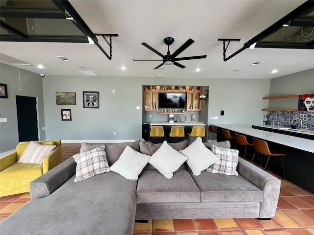 613 Wildcat Way, Kennedale, TX 76060 - living area with wet bar, recessed lighting, ceiling fan, attic access, and light tile patterned floors