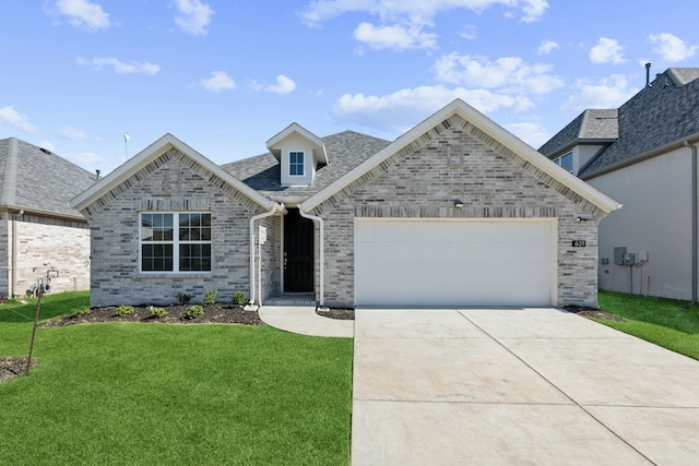 729 Rusty Spurs Pl, Weston, TX 75009 - french country style house with a front yard, an attached garage, concrete driveway, brick siding, and roof with shingles