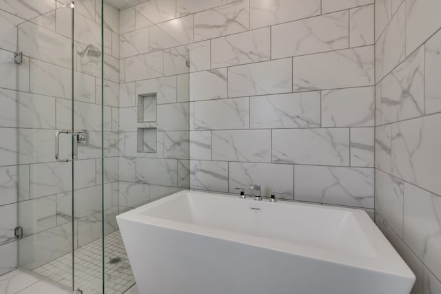 14936 Grissom Ave, Aledo, TX 76008 - bathroom featuring tile walls, a shower stall, and a soaking tub