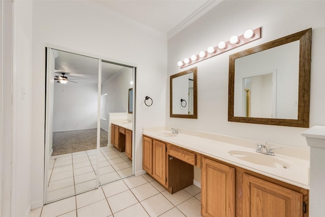 8525 Creekview Dr, Frisco, TX 75034 - bathroom with ornamental molding, double vanity, tile patterned floors, and a ceiling fan
