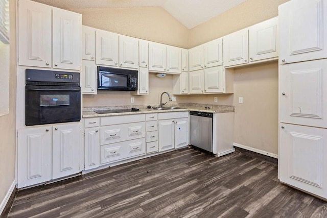 kitchen with black appliances, a sink, baseboards, dark wood-style floors, and lofted ceiling