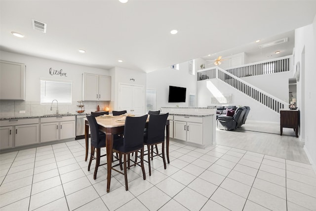 2040 Hartley Dr, Forney, TX 75126 - dining space featuring stairs, light tile patterned floors, recessed lighting, and ceiling fan