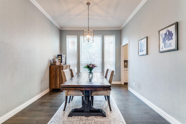 2401 Greenwich Dr, Carrollton, TX 75006 - dining space with dark wood finished floors, a chandelier, crown molding, and baseboards