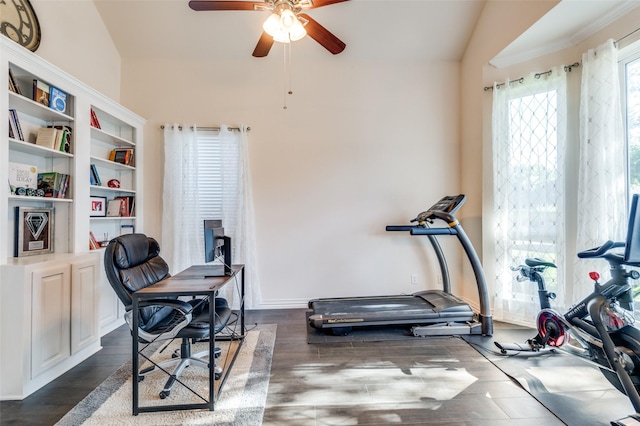 2401 Greenwich Dr, Carrollton, TX 75006 - home office featuring ceiling fan, dark wood-type flooring, and vaulted ceiling
