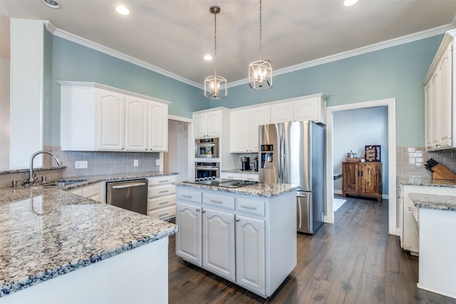 2401 Greenwich Dr, Carrollton, TX 75006 - kitchen with appliances with stainless steel finishes, a sink, white cabinets, a chandelier, and ornamental molding