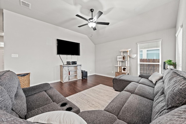 10116 Mickler Ln, Waco, TX 76708 - living room featuring dark wood-type flooring, ceiling fan, baseboards, and vaulted ceiling