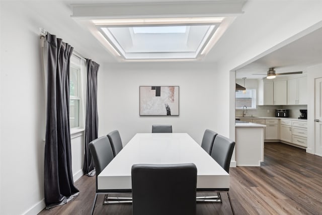 10834 Wyatt St, Dallas, TX 75218 - dining area featuring dark wood-style floors and baseboards