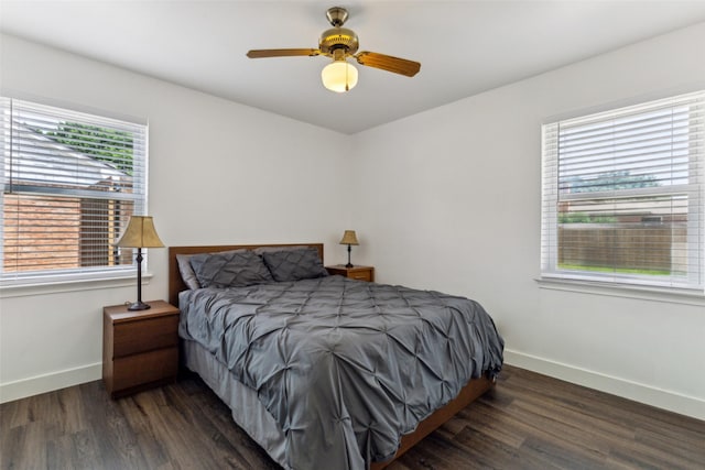 10834 Wyatt St, Dallas, TX 75218 - bedroom featuring baseboards, wood finished floors, and a ceiling fan