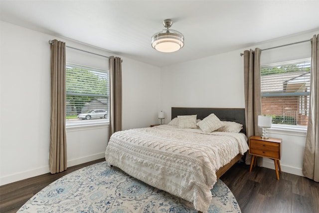 10834 Wyatt St, Dallas, TX 75218 - bedroom with wood finished floors and baseboards