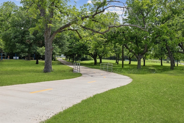 10834 Wyatt St, Dallas, TX 75218 - view of home's community featuring a yard and uncovered parking