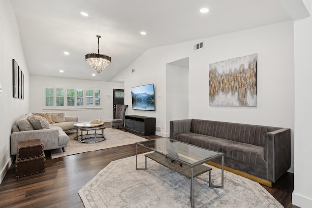 10834 Wyatt St, Dallas, TX 75218 - living room with lofted ceiling, wood finished floors, recessed lighting, baseboards, and a chandelier