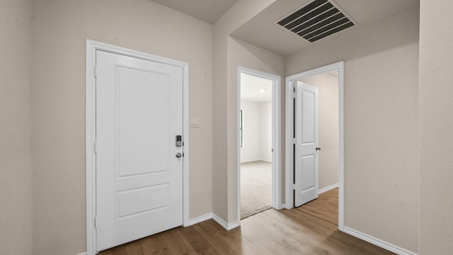 440 Drake Dr, Ferris, TX 75125 - hallway featuring wood finished floors and baseboards