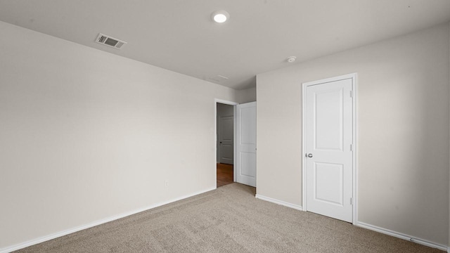 440 Drake Dr, Ferris, TX 75125 - unfurnished bedroom featuring carpet flooring and baseboards
