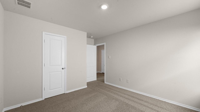 440 Drake Dr, Ferris, TX 75125 - unfurnished bedroom featuring carpet flooring and baseboards