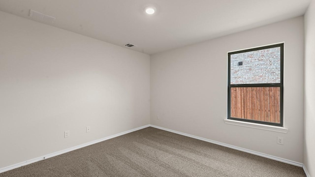 440 Drake Dr, Ferris, TX 75125 - unfurnished room with carpet and baseboards
