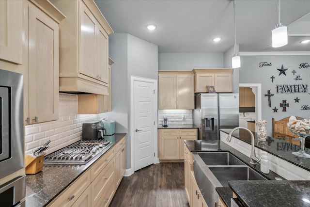 2231 Rana Park, Flint, TX 75762 - kitchen featuring appliances with stainless steel finishes, a sink, dark wood-style floors, backsplash, and hanging light fixtures