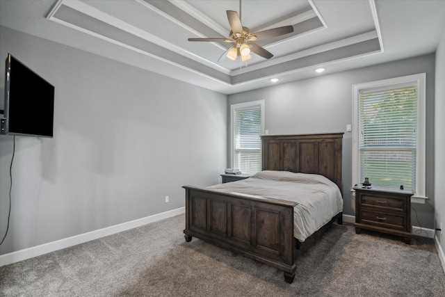 2231 Rana Park, Flint, TX 75762 - carpeted bedroom featuring a raised ceiling, baseboards, and a ceiling fan