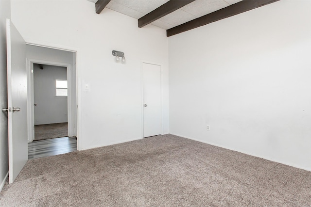 2627 Roger Williams Dr, Irving, TX 75061 - carpeted empty room featuring beam ceiling and baseboards