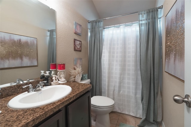 2717 Swift Creek Dr, Fort Worth, TX 76123 - bathroom featuring tile patterned floors, toilet, vanity, curtained shower, and vaulted ceiling