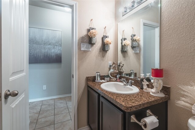 2717 Swift Creek Dr, Fort Worth, TX 76123 - half bath with vanity and tile patterned flooring