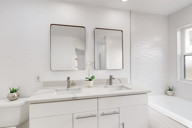 827 Astaire Ave, Duncanville, TX 75137 - full bath with toilet, double vanity, and a bath