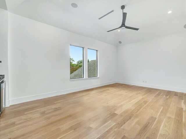 4633 Willow Ln, Dallas, TX 75244 - unfurnished room with ceiling fan, light wood finished floors, baseboards, recessed lighting, and lofted ceiling