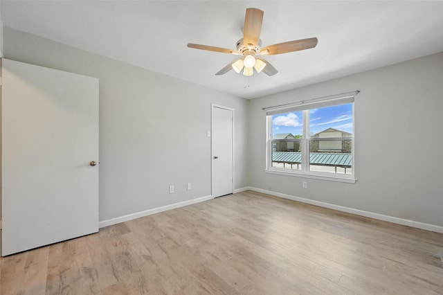 14800 Enterprise Dr Unit 17A, Farmers Branch, TX 75234 - unfurnished room featuring baseboards, light wood finished floors, and ceiling fan