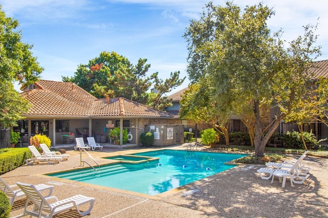 14800 Enterprise Dr Unit 17A, Farmers Branch, TX 75234 - view of swimming pool featuring a patio, fence, and a pool with connected hot tub