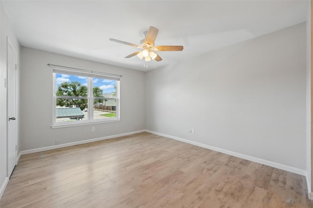 14800 Enterprise Dr Unit 17A, Farmers Branch, TX 75234 - unfurnished room featuring light wood-style flooring, baseboards, and ceiling fan
