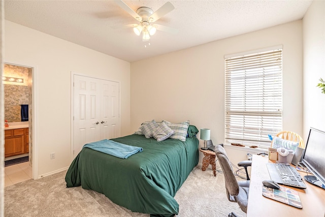 5929 Meadowcrest Ln, Sachse, TX 75048 - carpeted bedroom with connected bathroom, ceiling fan, a closet, and baseboards