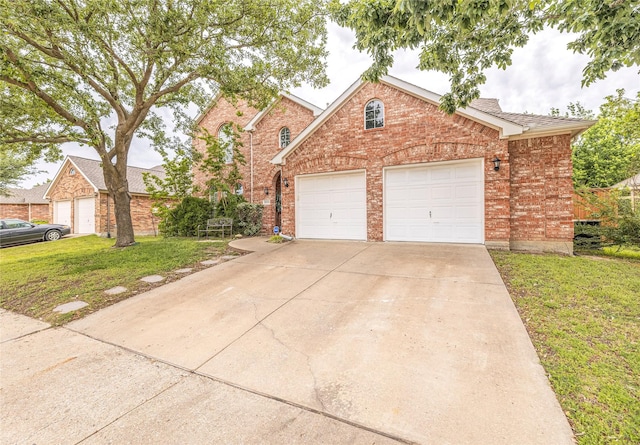 5929 Meadowcrest Ln, Sachse, TX 75048 - traditional home with brick siding, a front lawn, driveway, and an attached garage