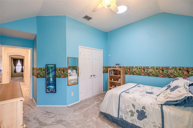 5929 Meadowcrest Ln, Sachse, TX 75048 - bedroom featuring lofted ceiling, carpet flooring, a closet, and ceiling fan