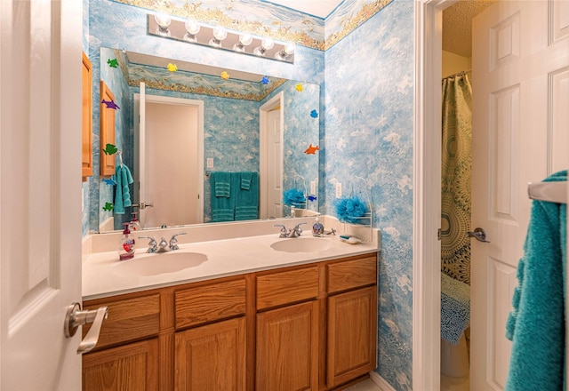 5929 Meadowcrest Ln, Sachse, TX 75048 - full bathroom featuring wallpapered walls and double vanity