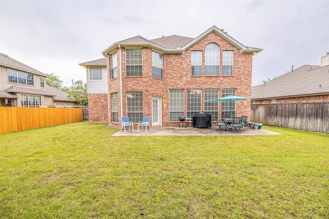 5929 Meadowcrest Ln, Sachse, TX 75048 - rear view of property featuring brick siding, a patio area, and cooling unit