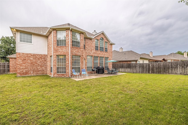 5929 Meadowcrest Ln, Sachse, TX 75048 - rear view of house with a patio area and brick siding