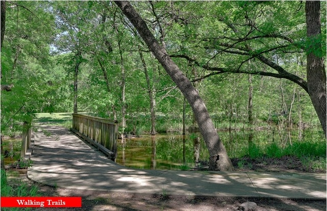 5929 Meadowcrest Ln, Sachse, TX 75048 - view of community with a wooded view