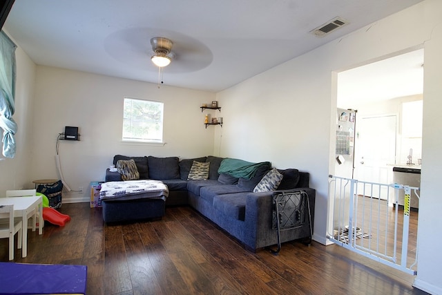 110 S Alma Ave, Kerens, TX 75144 - living area featuring ceiling fan, wood-type flooring, and baseboards