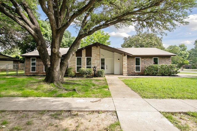 404 Anita Ave, Keller, TX 76248 - mid-century inspired home with a gate and brick siding