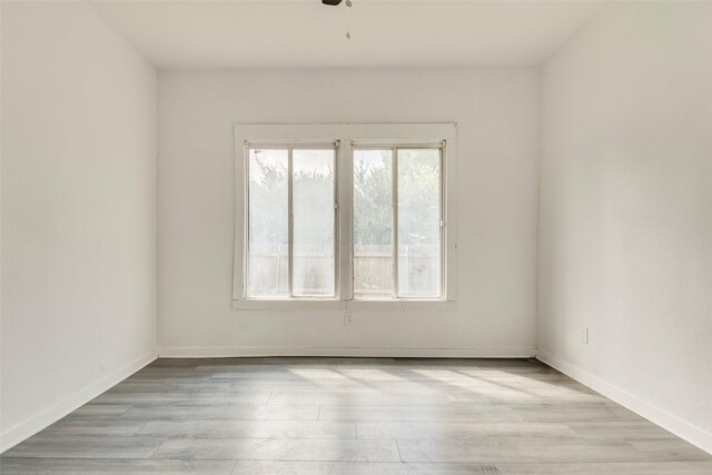 4423 Colonial Ave, Dallas, TX 75215 - empty room featuring wood finished floors and baseboards