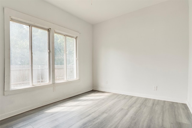 4423 Colonial Ave, Dallas, TX 75215 - unfurnished room featuring light wood-style floors and baseboards