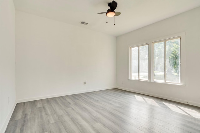 4423 Colonial Ave, Dallas, TX 75215 - empty room featuring light wood finished floors, ceiling fan, and baseboards