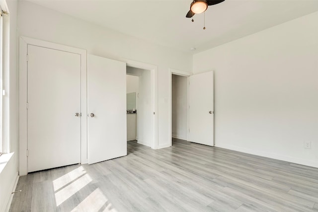 4423 Colonial Ave, Dallas, TX 75215 - unfurnished bedroom featuring light wood-type flooring, ceiling fan, and baseboards