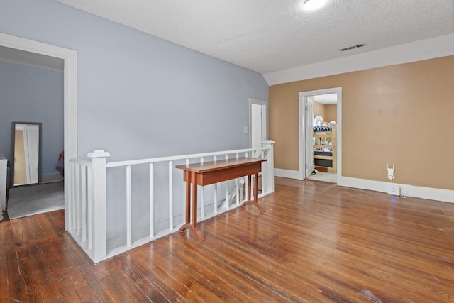 229 College, Italy, TX 76651 - unfurnished room featuring wood finished floors