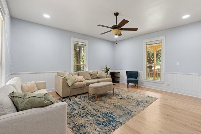 229 College, Italy, TX 76651 - living room featuring a wainscoted wall, healthy amount of natural light, wood finished floors, a ceiling fan, and recessed lighting