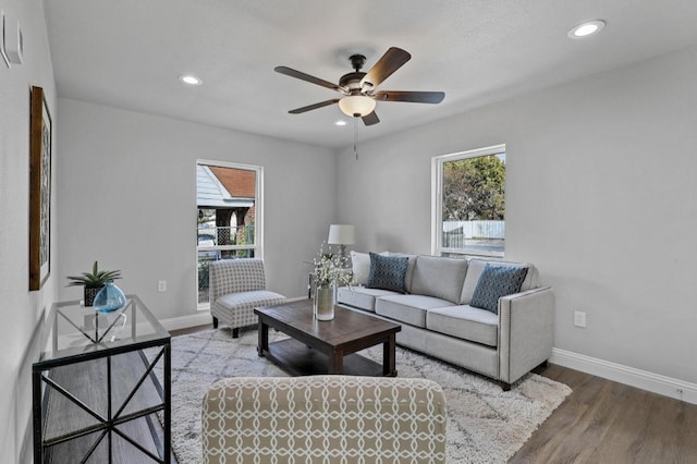 2739 S Denley Dr, Dallas, TX 75216 - living room featuring plenty of natural light, wood finished floors, a ceiling fan, baseboards, and recessed lighting
