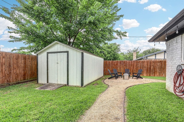 7824 Daniel Dr, North Richland Hills, TX 76182 - view of yard with an outdoor structure, a storage shed, and an outdoor fire pit