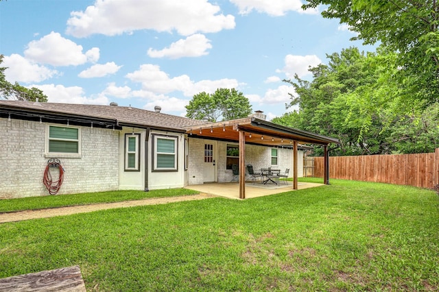 7824 Daniel Dr, North Richland Hills, TX 76182 - back of house with a patio, a shingled roof, and brick siding