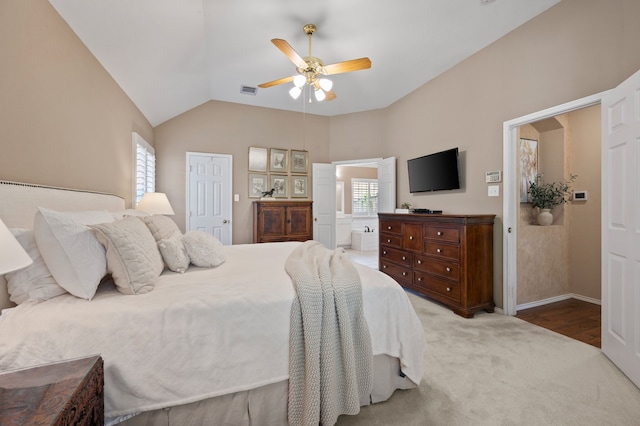 4252 Millview Ln, Dallas, TX 75287 - bedroom featuring lofted ceiling, carpet floors, a ceiling fan, connected bathroom, and baseboards