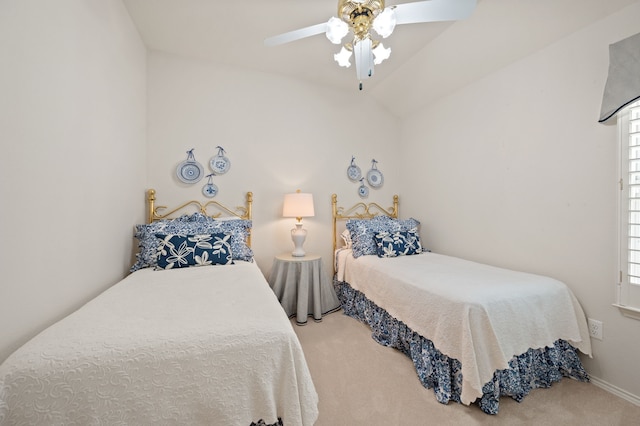 4252 Millview Ln, Dallas, TX 75287 - bedroom with carpet floors, multiple windows, ceiling fan, vaulted ceiling, and baseboards