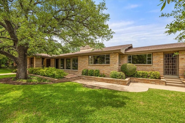 2900 Simondale Dr, Fort Worth, TX 76109 - ranch-style home with a front lawn and a chimney